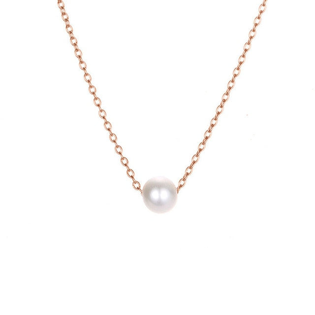 Collier avec pendentif en perles