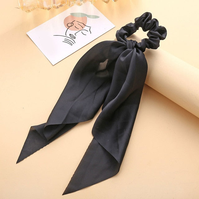 Élastique à cheveux en satin avec nœud papillon (13 couleurs)