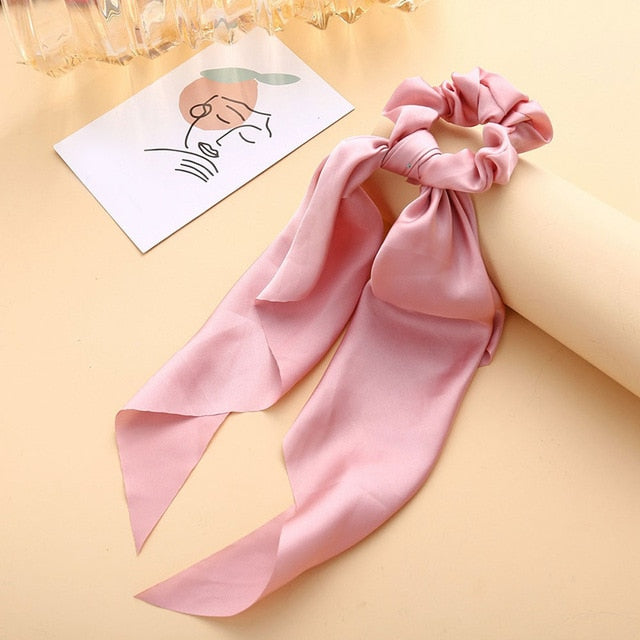 Élastique à cheveux en satin avec nœud papillon (13 couleurs)