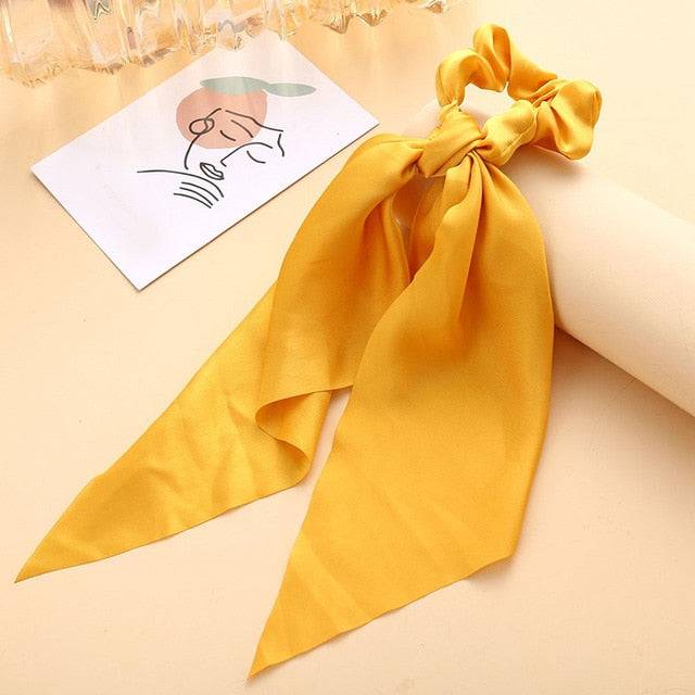 Élastique à cheveux en satin avec nœud papillon (13 couleurs)