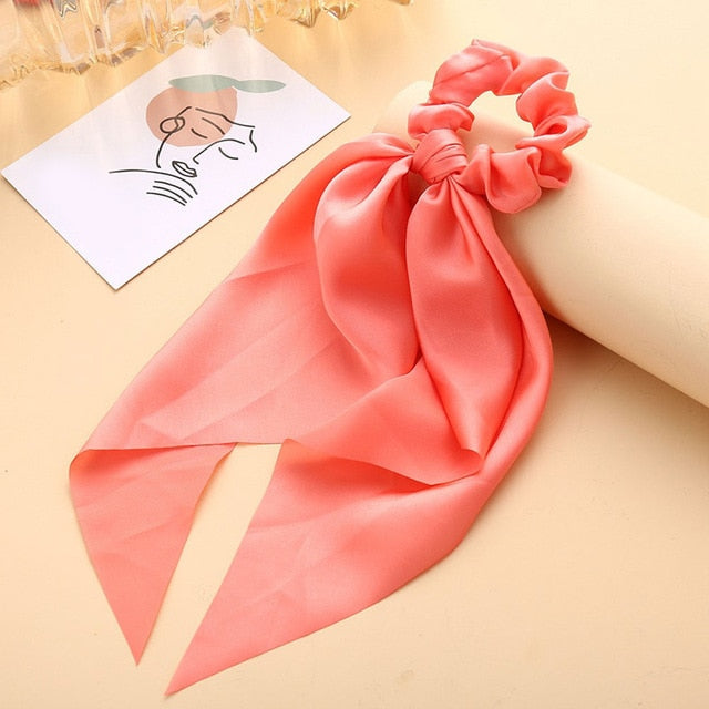 Élastique à cheveux en satin avec nœud papillon (13 couleurs)