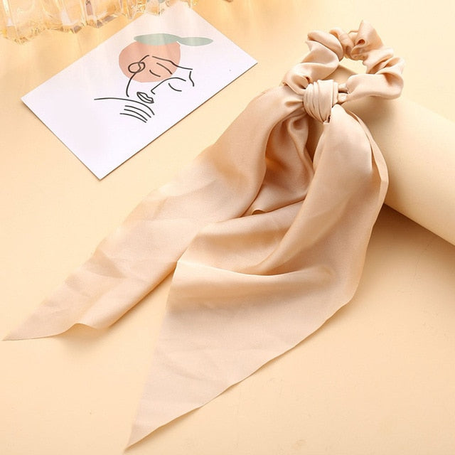 Élastique à cheveux en satin avec nœud papillon (13 couleurs)