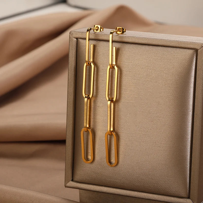 Boucles d'oreilles pendantes en forme de trombone